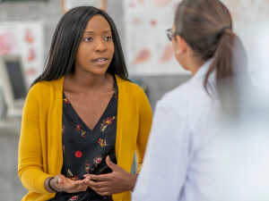 woman talking to doctor