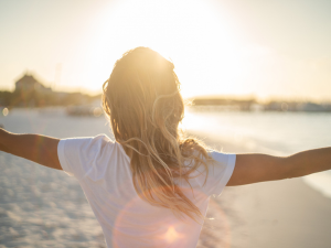 woman happy sunset